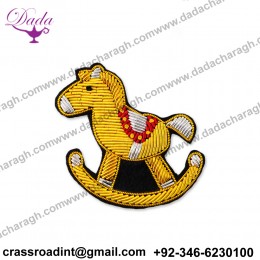 Goldwork badge brooch
