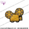 Goldwork bullion wire brooch