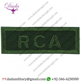 RCA (ROYAL CANADIAN ARTILLERY) GREEN ON OLIVE EMBROIDERED NON-BRITISH ARMY SHOULDER TITLE