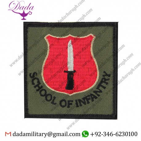SCHOOL OF INFANTRY BAYONET ON SHIELD WITH WORDS ON OLIVE SQUARE EMBROIDERED FORMATION ARM BADGE