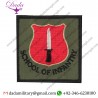 SCHOOL OF INFANTRY BAYONET ON SHIELD WITH WORDS ON OLIVE SQUARE EMBROIDERED FORMATION ARM BADGE