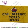 CIVIL DEFENCE CORPS RESCUE ARMBAND (REGIONAL STAFF) NAVY BLUE ON YELLOW WITH KING'S CROWN. EMBROIDERED ARM-BAND OR BRASSARD