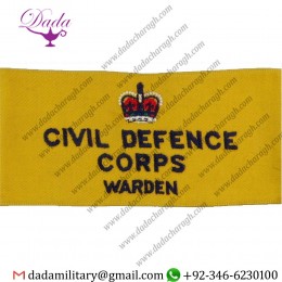 CIVIL DEFENCE CORPS WARDEN ARMBAND (REGIONAL STAFF) NAVY BLUE ON YELLOW WITH QUEEN ELIZABETH'S CROWN. EMBROIDERED