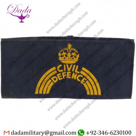 CIVIL DEFENCE ARMBAND YELLOW ON NAVY BLUE WITH KING'S CROWN. PAINTED ARM-BAND OR BRASSARD